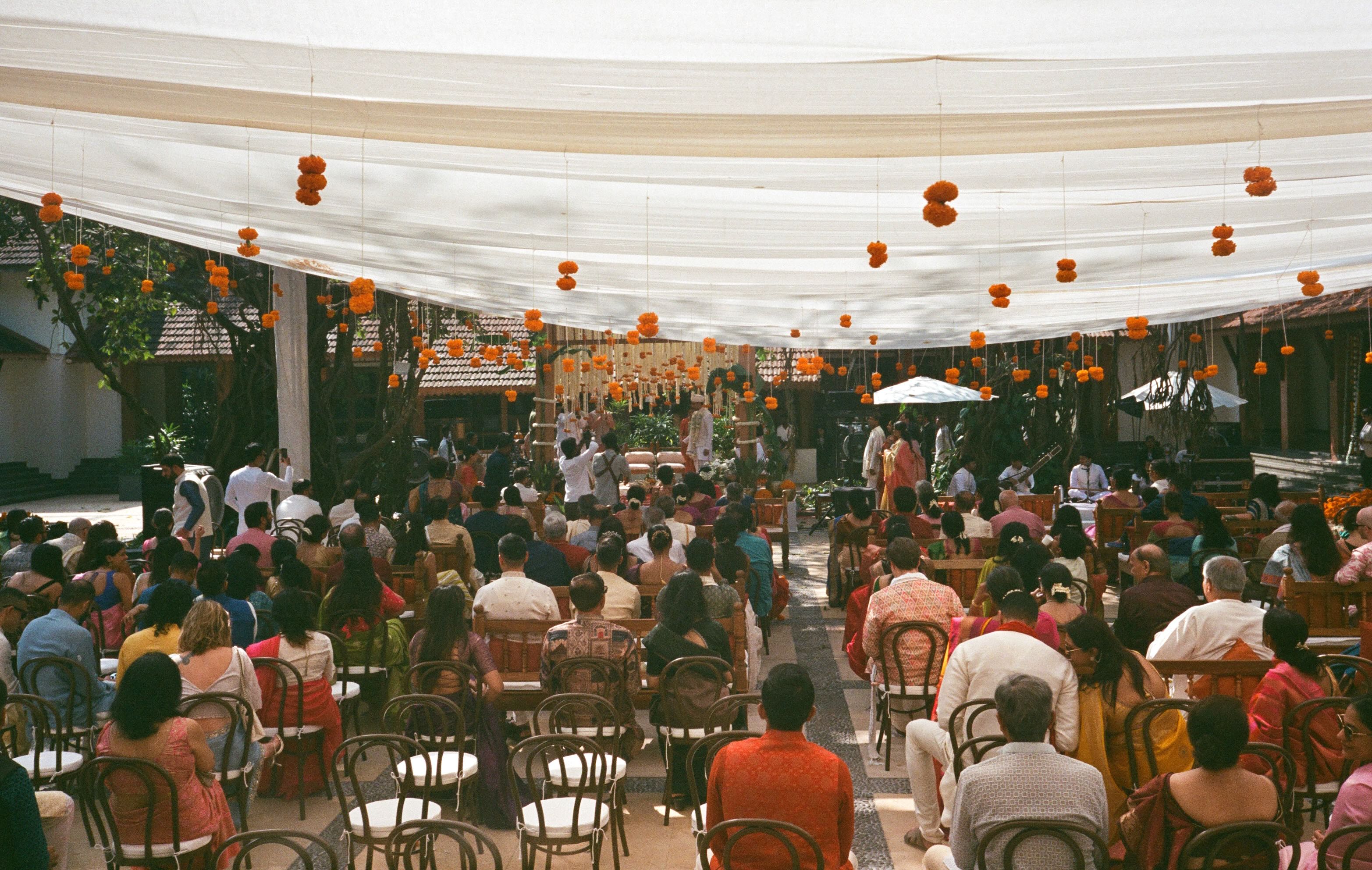 a gathering beneath a canopy at alila diwa goa